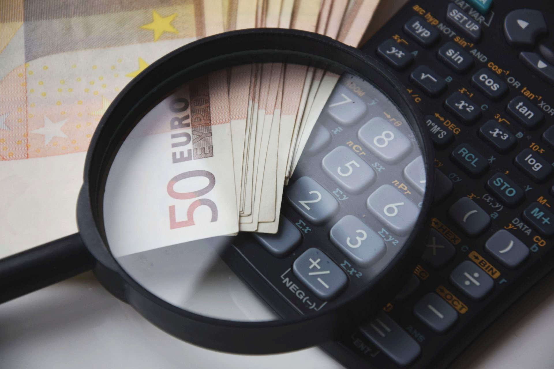 Canva – 50 Euro Banknote Beside Black Calculator